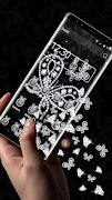 برنامه‌نما Glitter Butterfly Gravity Theme عکس از صفحه