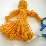 Como hacer una muñeca de hilo biểu tượng