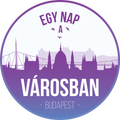 ”Városban