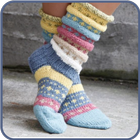 Sock knitting with needles icon