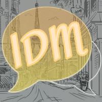 IDM الملصق