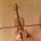 Worlds Smallest Violin Zeichen